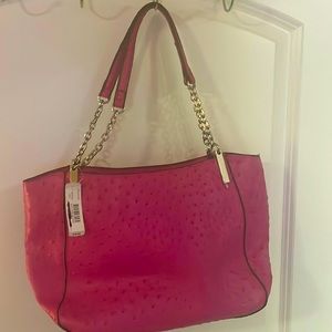 Pink leather handbag and clutch